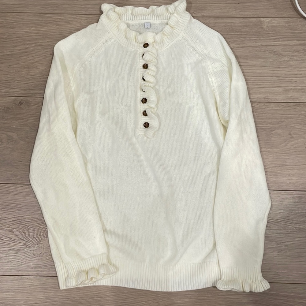 White knit ruffle sweater. Size small.
